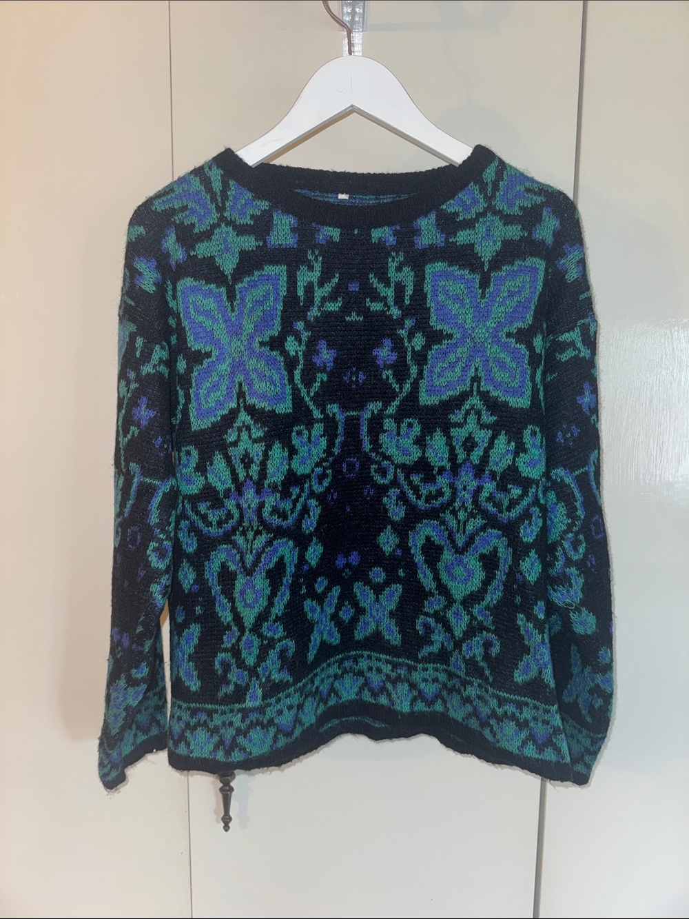 Black Sweater with Blue-Green Pattern